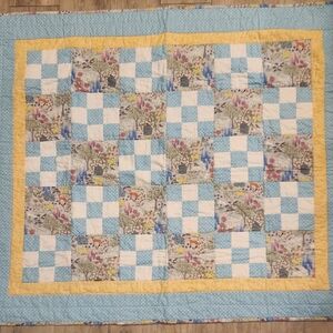 Floral Patchwork Quilt with Blue and Yellow Accents